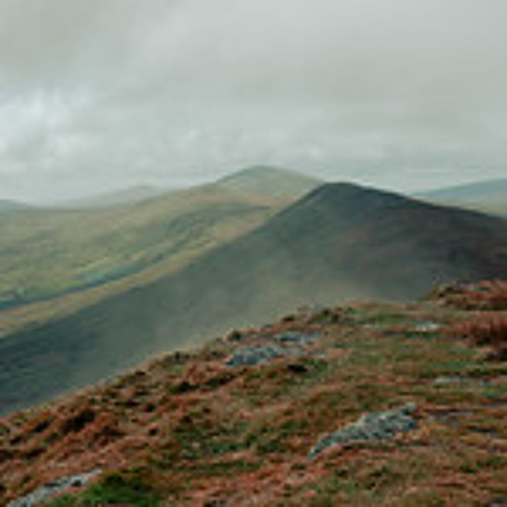 View of misty mountains on a cloudy day.