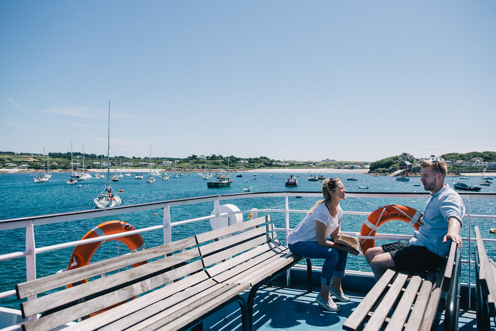 couple sitting on the Scillonian III in St. Mary's Harbour